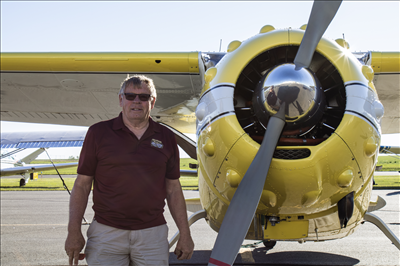 Bob Simmers with his Cessna 195.